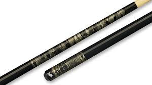 Close-up of black billiard cue sticks with camouflage-patterned grips on white background